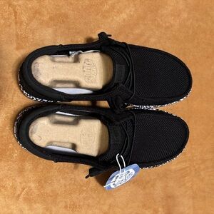 Women’s Hey Dude Black and White Casual Shoes